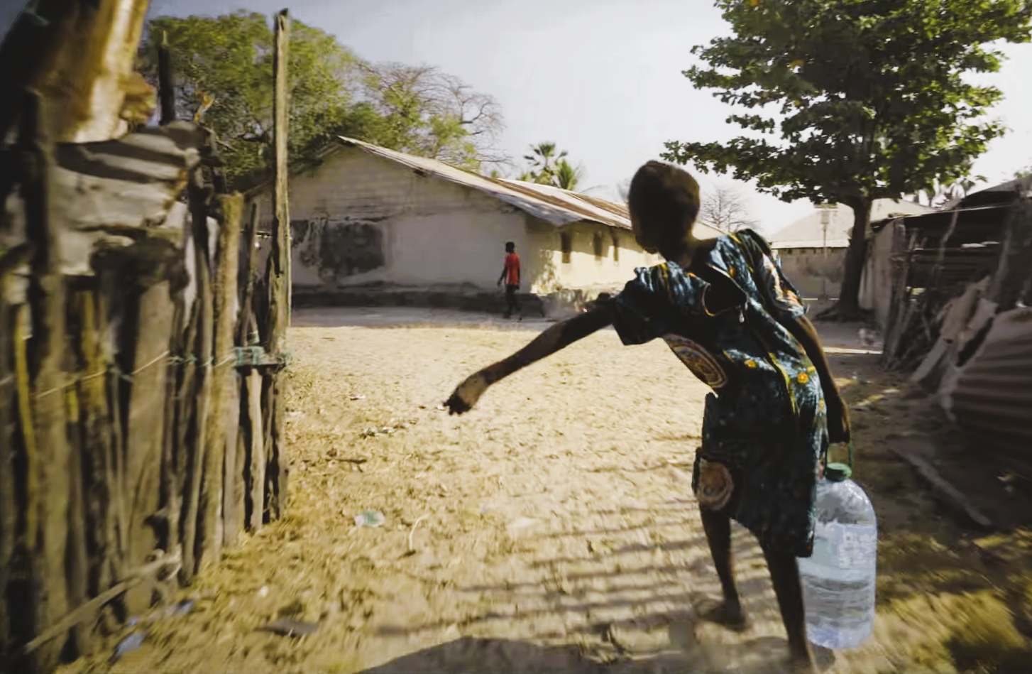 Girl carrying water bottle