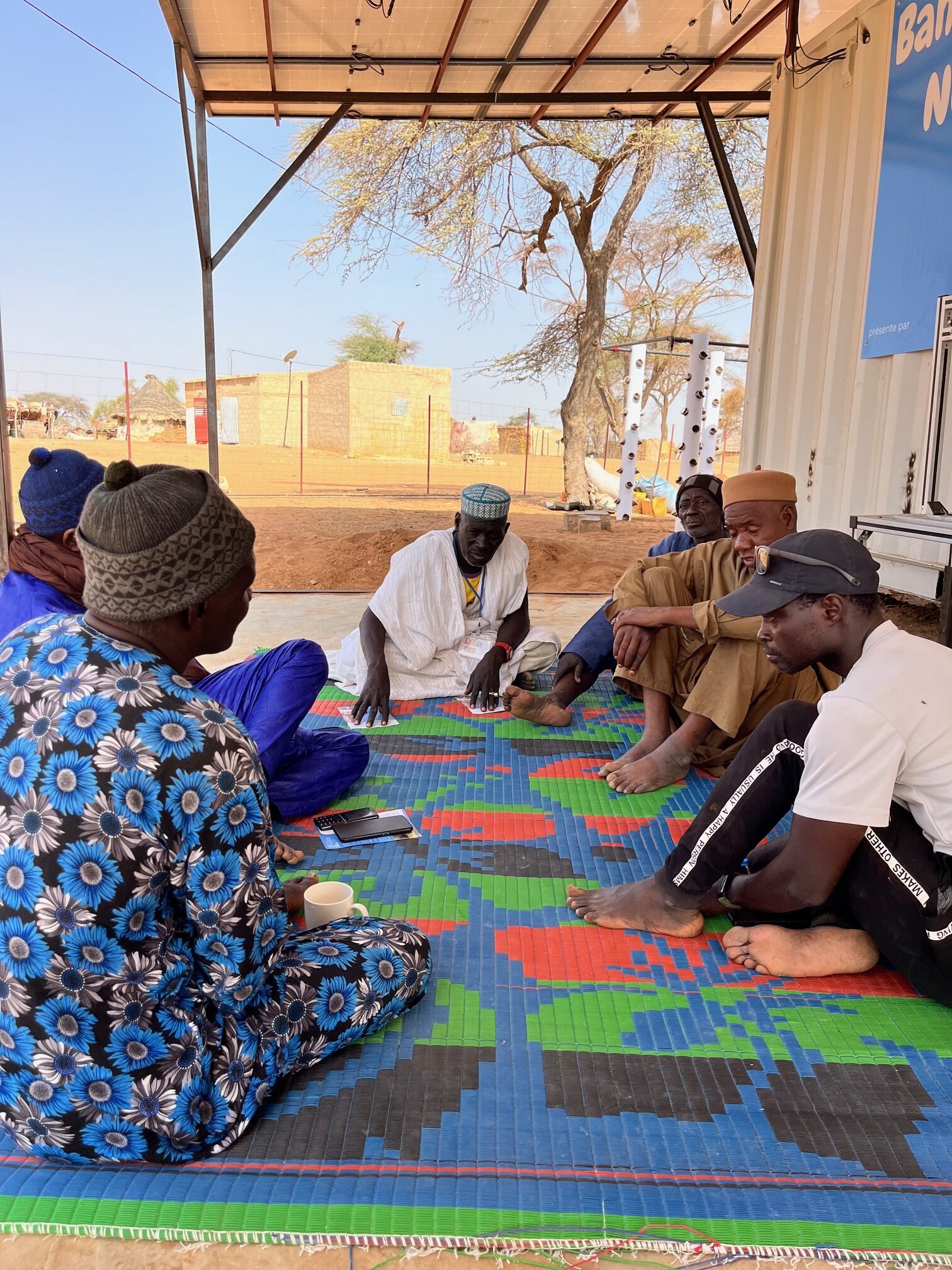 Elder of the communities in a chat at Water Kiosk Banneexu Ndox